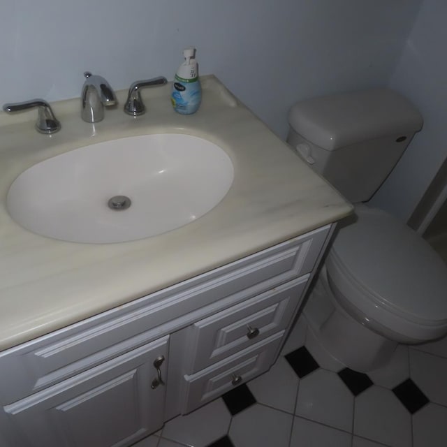 457 N Cambridge Dr Unit 457, Palatine, IL 60067 - bathroom with vanity, tile patterned floors, and toilet