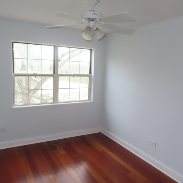 457 N Cambridge Dr Unit 457, Palatine, IL 60067 - spare room featuring baseboards, a ceiling fan, wood finished floors, and visible vents