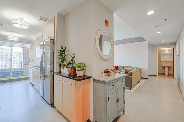 77 S Evergreen Ave Unit 1004, Arlington Heights, IL 60005 - hall with recessed lighting and a sink