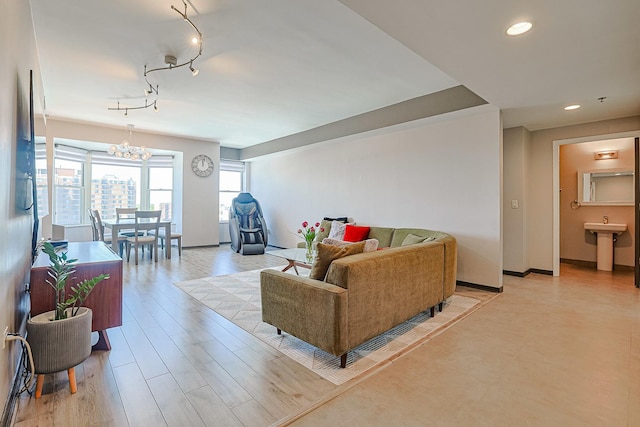 77 S Evergreen Ave Unit 1004, Arlington Heights, IL 60005 - living area with a chandelier, recessed lighting, and baseboards