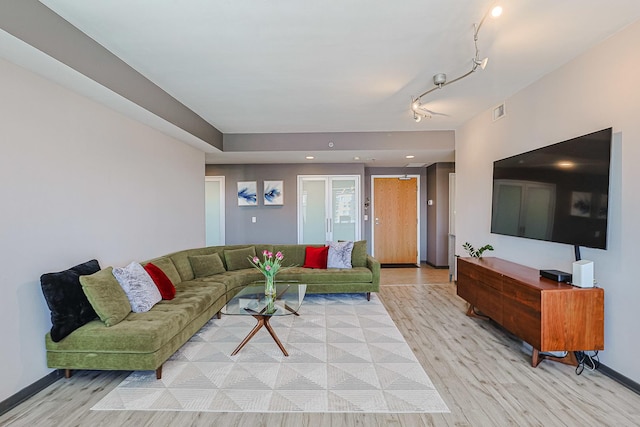 77 S Evergreen Ave Unit 1004, Arlington Heights, IL 60005 - living area featuring light wood-type flooring and baseboards