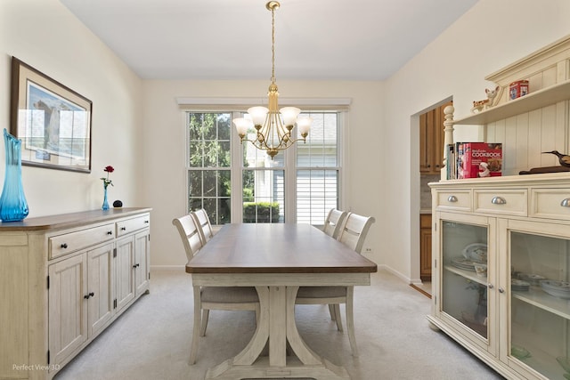 36225 N Goldspring Ct, Gurnee, IL 60031 - dining space with light colored carpet, a chandelier, and baseboards