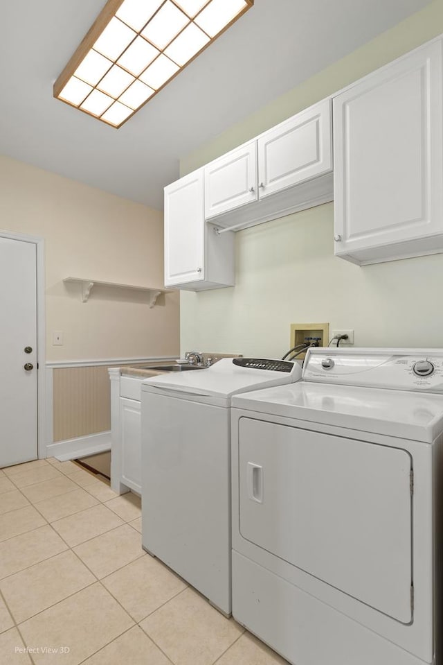 36225 N Goldspring Ct, Gurnee, IL 60031 - washroom featuring cabinet space, separate washer and dryer, light tile patterned flooring, and wainscoting