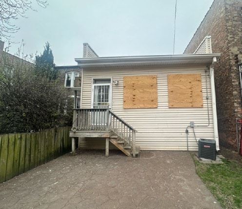5217 S Ingleside Ave, Chicago, IL 60615 - back of property with fence and central AC