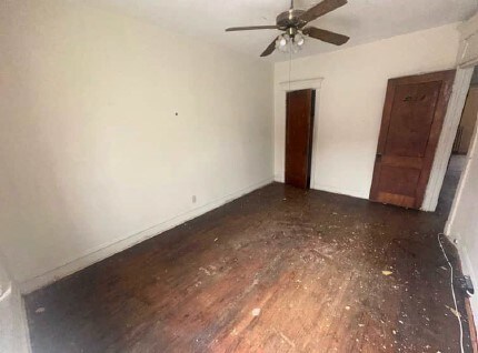5217 S Ingleside Ave, Chicago, IL 60615 - unfurnished bedroom featuring baseboards