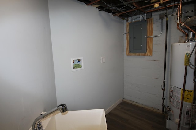 laundry room featuring laundry area, water heater, wood finished floors, and electric panel