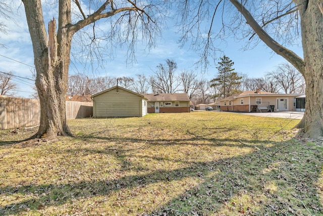 view of yard with fence