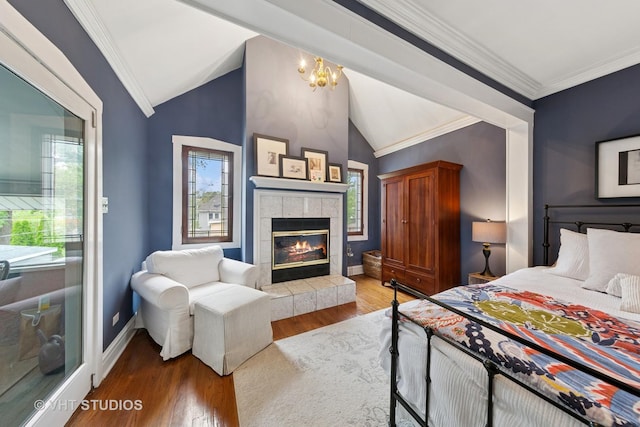 9606 S Vanderpoel Ave, Chicago, IL 60643 - bedroom with lofted ceiling, wood finished floors, ornamental molding, a tile fireplace, and baseboards