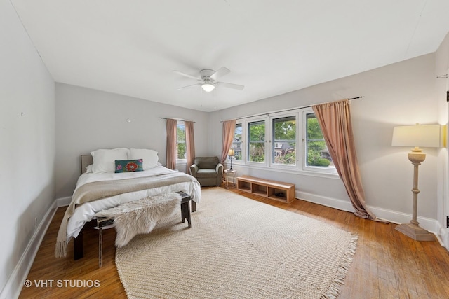 9606 S Vanderpoel Ave, Chicago, IL 60643 - bedroom with baseboards, light wood-style floors, and a ceiling fan