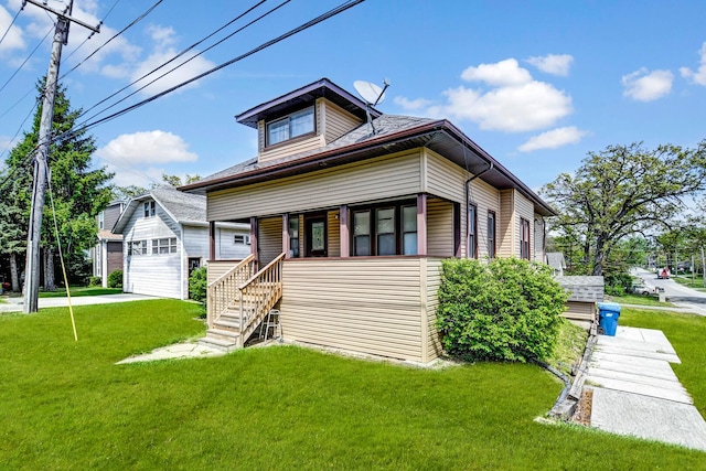14845 Cicero Ave, Oak Forest, IL 60452 - view of front facade with an outbuilding, covered porch, a detached garage, and a front lawn