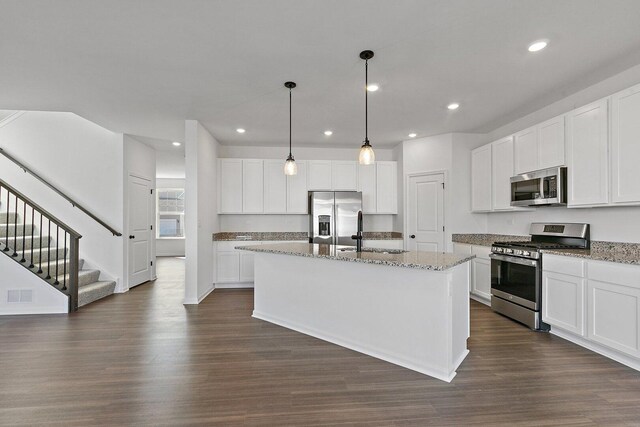 32013 Savannah Dr, Lakemoor, IL 60051 - kitchen with visible vents, a sink, dark wood finished floors, and stainless steel appliances