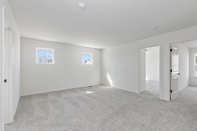 32013 Savannah Dr, Lakemoor, IL 60051 - carpeted empty room with baseboards