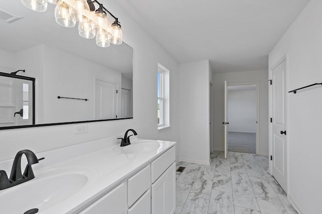 32013 Savannah Dr, Lakemoor, IL 60051 - full bath with double vanity, visible vents, a sink, and marble finish floor