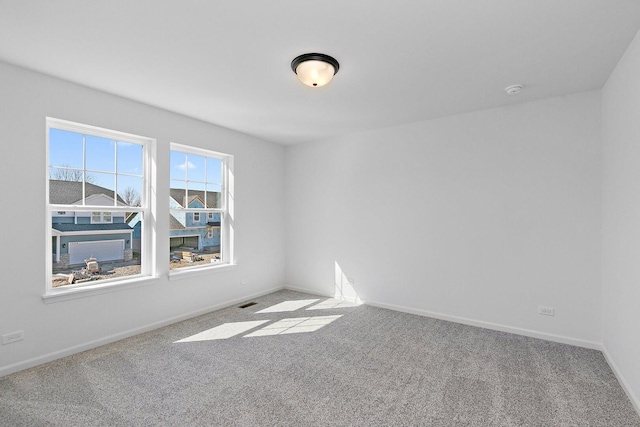 32013 Savannah Dr, Lakemoor, IL 60051 - empty room featuring baseboards and carpet