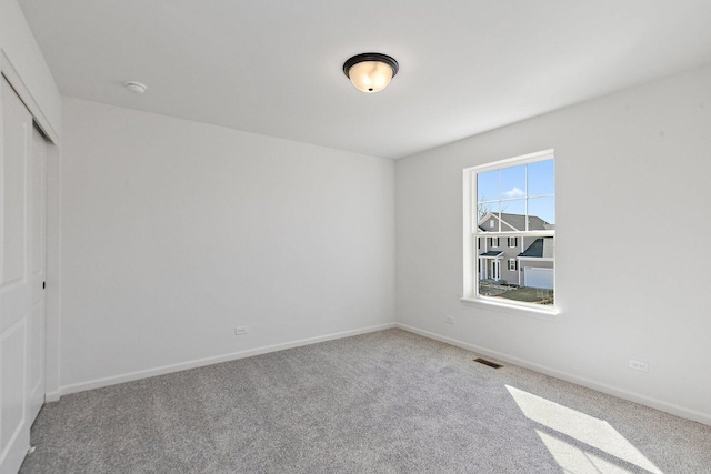 32013 Savannah Dr, Lakemoor, IL 60051 - carpeted spare room with baseboards and visible vents