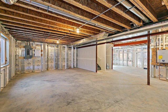32013 Savannah Dr, Lakemoor, IL 60051 - unfinished basement featuring tankless water heater and electric panel