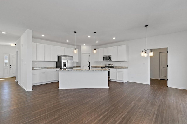 32013 Savannah Dr, Lakemoor, IL 60051 - kitchen featuring recessed lighting, baseboards, appliances with stainless steel finishes, and a center island with sink