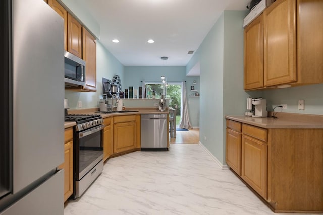 3412 Blue Ridge Dr, Carpentersville, IL 60110 - kitchen with appliances with stainless steel finishes, light marble finish flooring, a sink, a peninsula, and recessed lighting