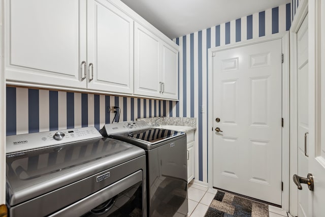 301 Hambletonian Dr, Oak Brook, IL 60523 - laundry room with wallpapered walls, cabinet space, washing machine and clothes dryer, and light tile patterned flooring