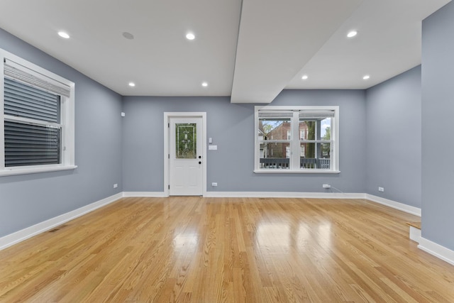 5052 W Huron St, Chicago, IL 60644 - entrance foyer with recessed lighting, baseboards, visible vents, and light wood finished floors