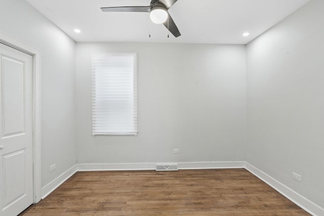 1319 Washington St, Chicago Heights, IL 60411 - spare room featuring a ceiling fan, visible vents, wood finished floors, baseboards, and recessed lighting