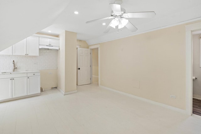 1319 Washington St, Chicago Heights, IL 60411 - interior space featuring a ceiling fan, vaulted ceiling, a sink, baseboards, and recessed lighting