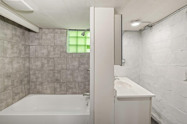 1319 Washington St, Chicago Heights, IL 60411 - full bathroom featuring vanity, shower / tub combination, visible vents, and concrete block wall
