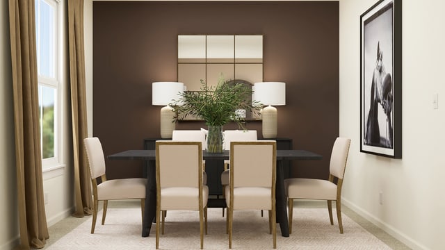 carpeted dining space featuring baseboards and a healthy amount of sunlight