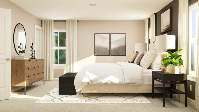 bedroom with light carpet