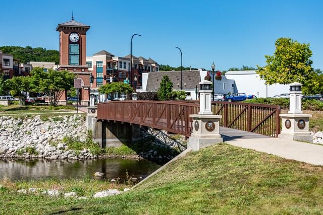 surrounding community with a water view