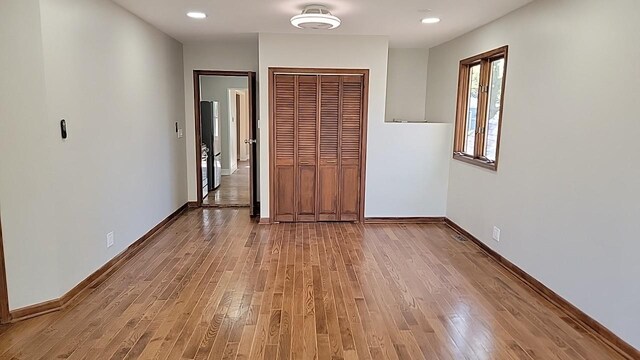226 N Wilmette Ave, Westmont, IL 60559 - interior space featuring baseboards, a closet, and light wood finished floors