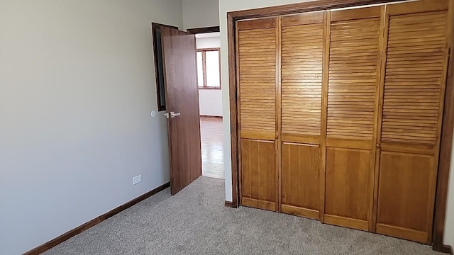 226 N Wilmette Ave, Westmont, IL 60559 - unfurnished bedroom featuring a closet, carpet, and baseboards