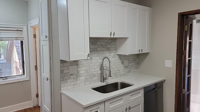 226 N Wilmette Ave, Westmont, IL 60559 - kitchen featuring a sink, light countertops, backsplash, and dishwasher