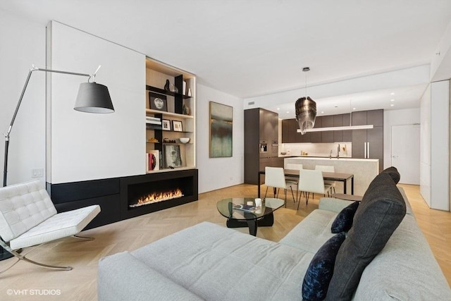 1917 S Calumet Ave, Chicago, IL 60616 - living room featuring a lit fireplace