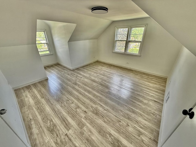 106 Kazwell St, Willow Springs, IL 60480 - bonus room with wood finished floors, lofted ceiling, and baseboards