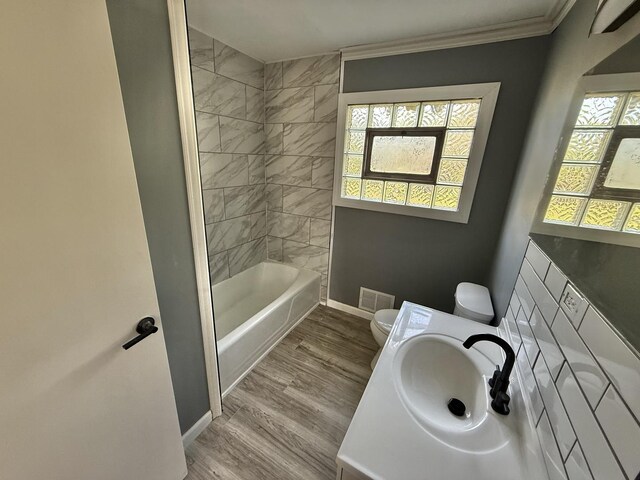 106 Kazwell St, Willow Springs, IL 60480 - bathroom with toilet, baseboards, healthy amount of natural light, ornamental molding, and wood finished floors