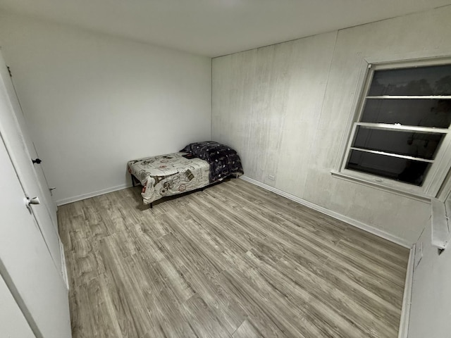 106 Kazwell St, Willow Springs, IL 60480 - unfurnished bedroom with wood finished floors