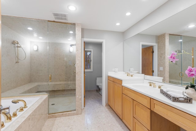 full bathroom with visible vents, toilet, a bath, a sink, and a stall shower
