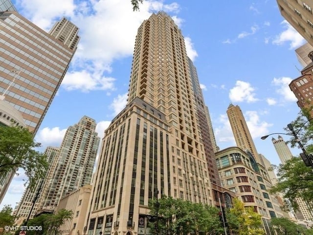 118 E Erie St Unit 19C, Chicago, IL 60611 - view of building exterior featuring a city view