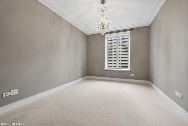 118 E Erie St Unit 19C, Chicago, IL 60611 - carpeted empty room featuring crown molding, baseboards, and a chandelier