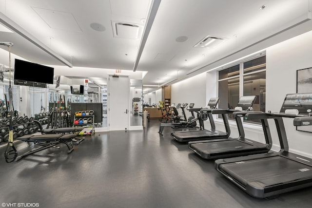 118 E Erie St Unit 19C, Chicago, IL 60611 - exercise room featuring baseboards and visible vents