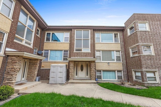 5532 W Lawrence Ave Unit 2S, Chicago, IL 60630 - view of front of home featuring brick siding