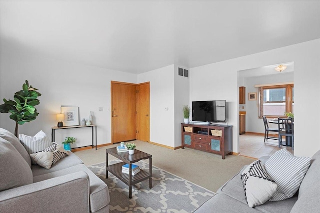 5532 W Lawrence Ave Unit 2S, Chicago, IL 60630 - living room with baseboards and light carpet