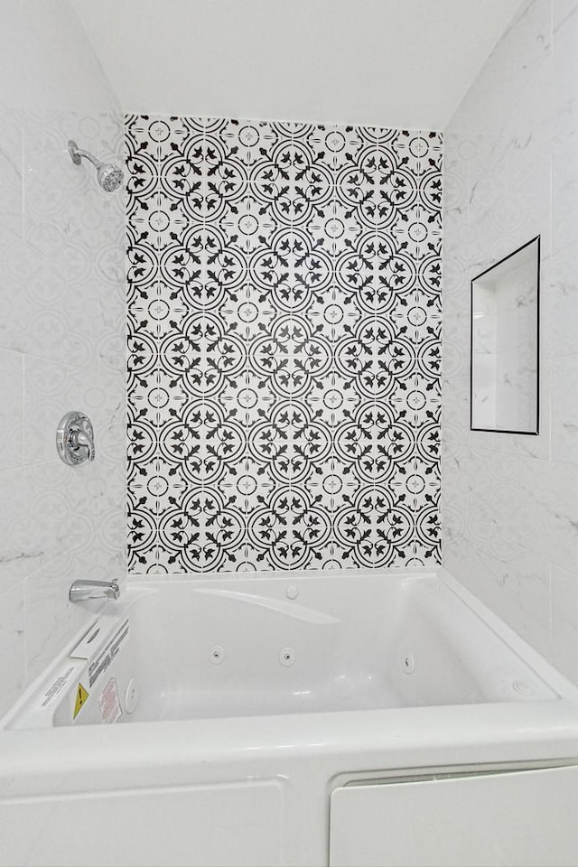 full bathroom with a combined bath / shower with jetted tub