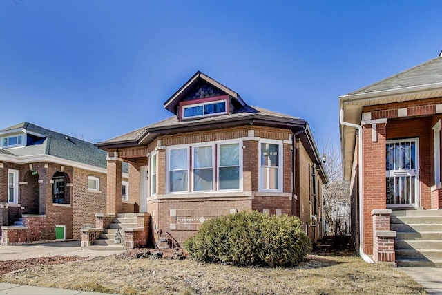 view of front of home with brick siding