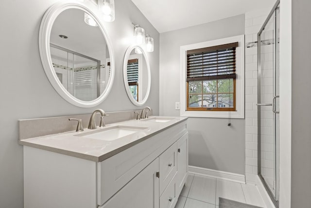 bedroom with a ceiling fan, ensuite bathroom, baseboards, light colored carpet, and lofted ceiling