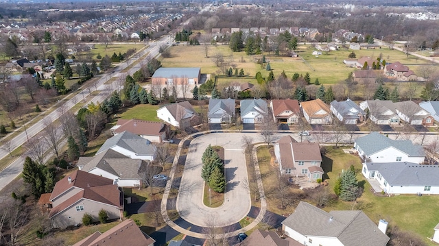 birds eye view of property with a residential view