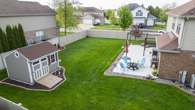 24515 Echo Ln, Manhattan, IL 60442 - view of yard featuring an outdoor fire pit, a patio, and a residential view