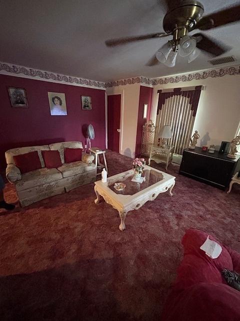 19364 US Highway 34, Princeton, IL 61356 - carpeted living area with ceiling fan