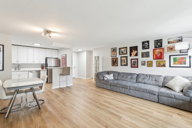 400 E Randolph St Unit 2424, Chicago, IL 60601 - living area with baseboards and light wood-style floors